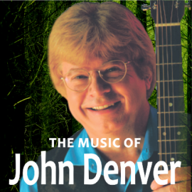 Jim Curry holding guitar in The Music of John Denver